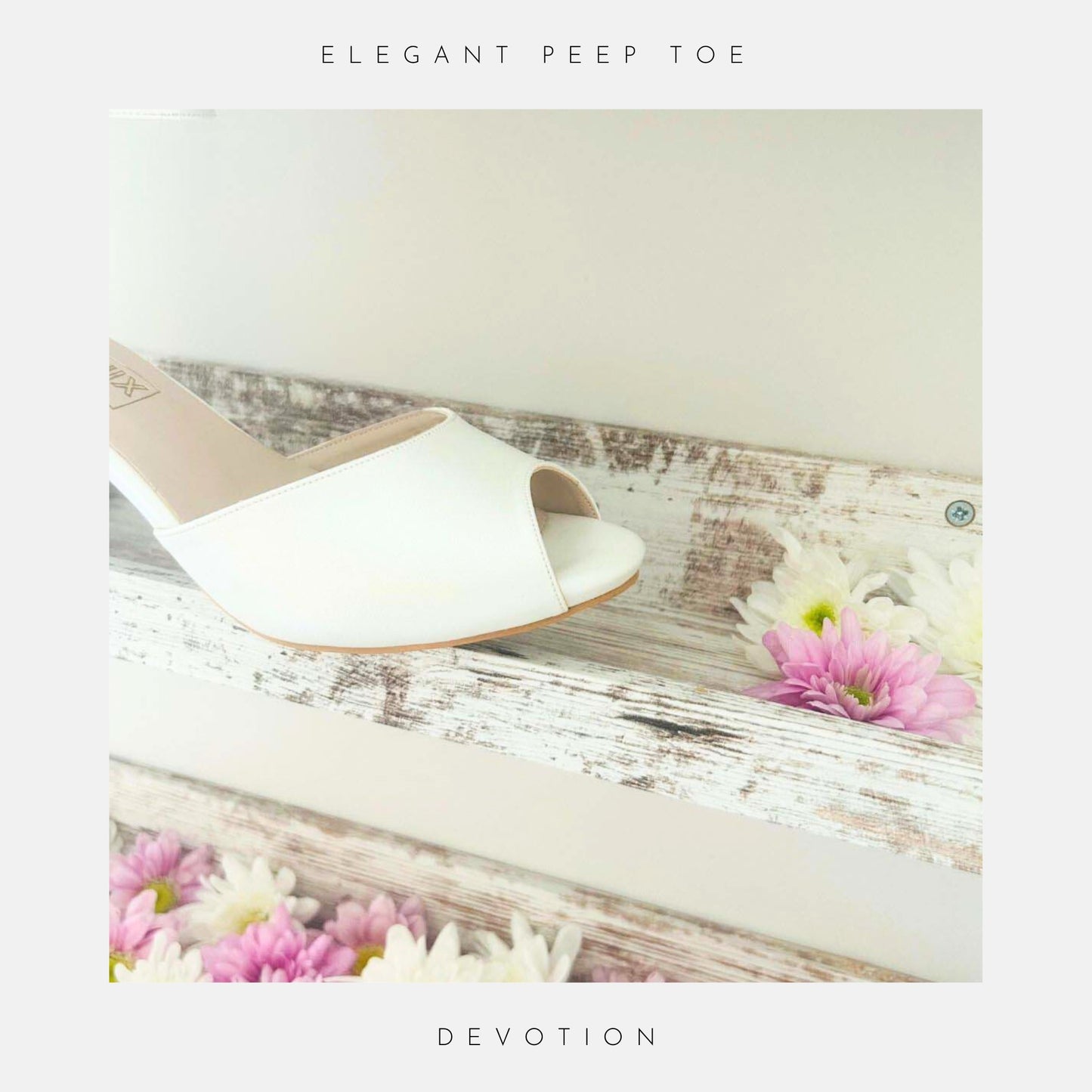 Devotion Peep Toe Kitten Heel Bridal Shoes by Phoenix England in pearl ivory vegan leather, featuring an adjustable ankle strap and chic peep toe, are displayed on a white background.