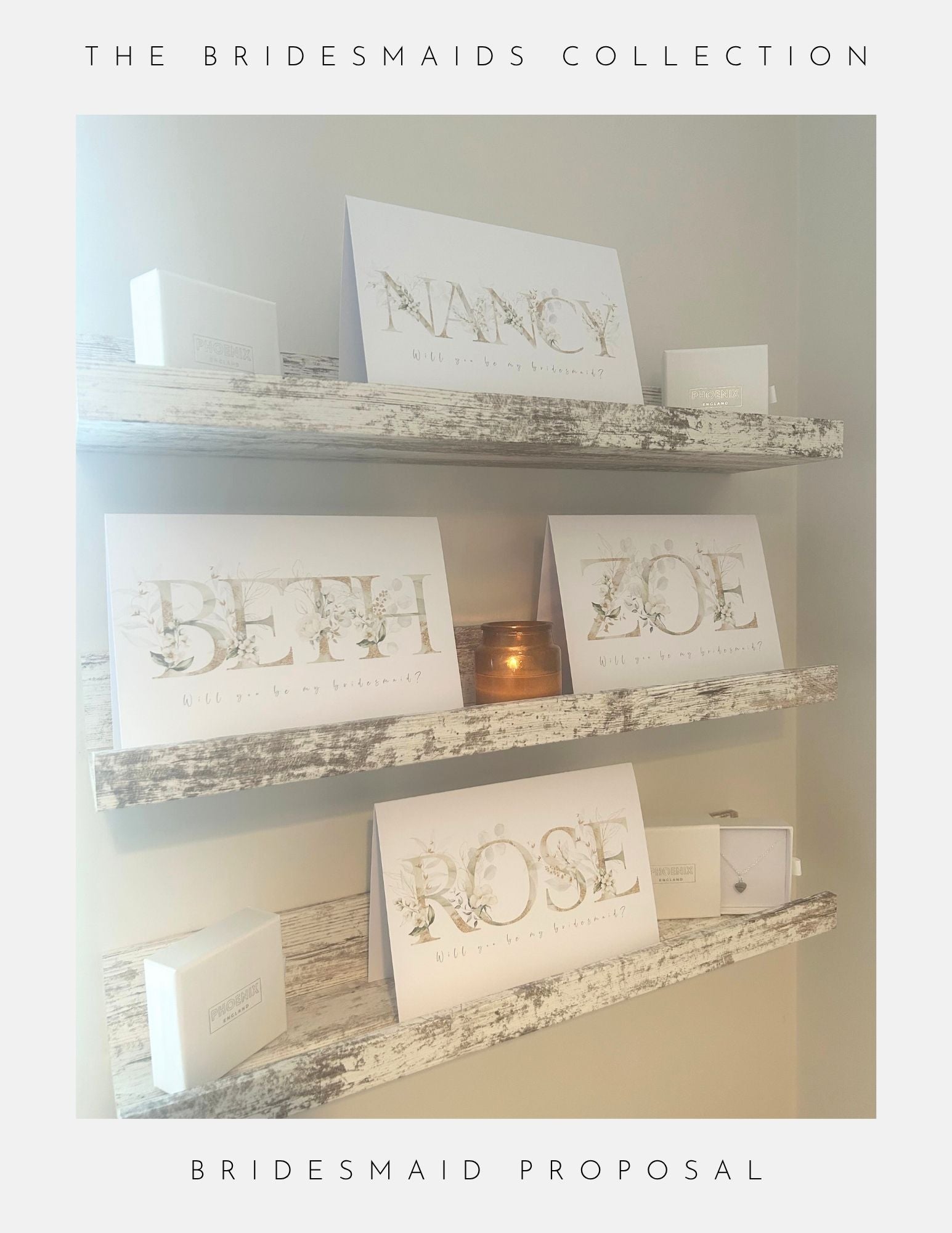 Three rustic shelves display white floral cards with the names NANCY, BETH, ROSE, and ZOE, each asking Will you be my bridesmaid? Featuring Phoenix England Be My Bridesmaid Gifts such as white boxes or Sterling Silver Jewellery are also shown.