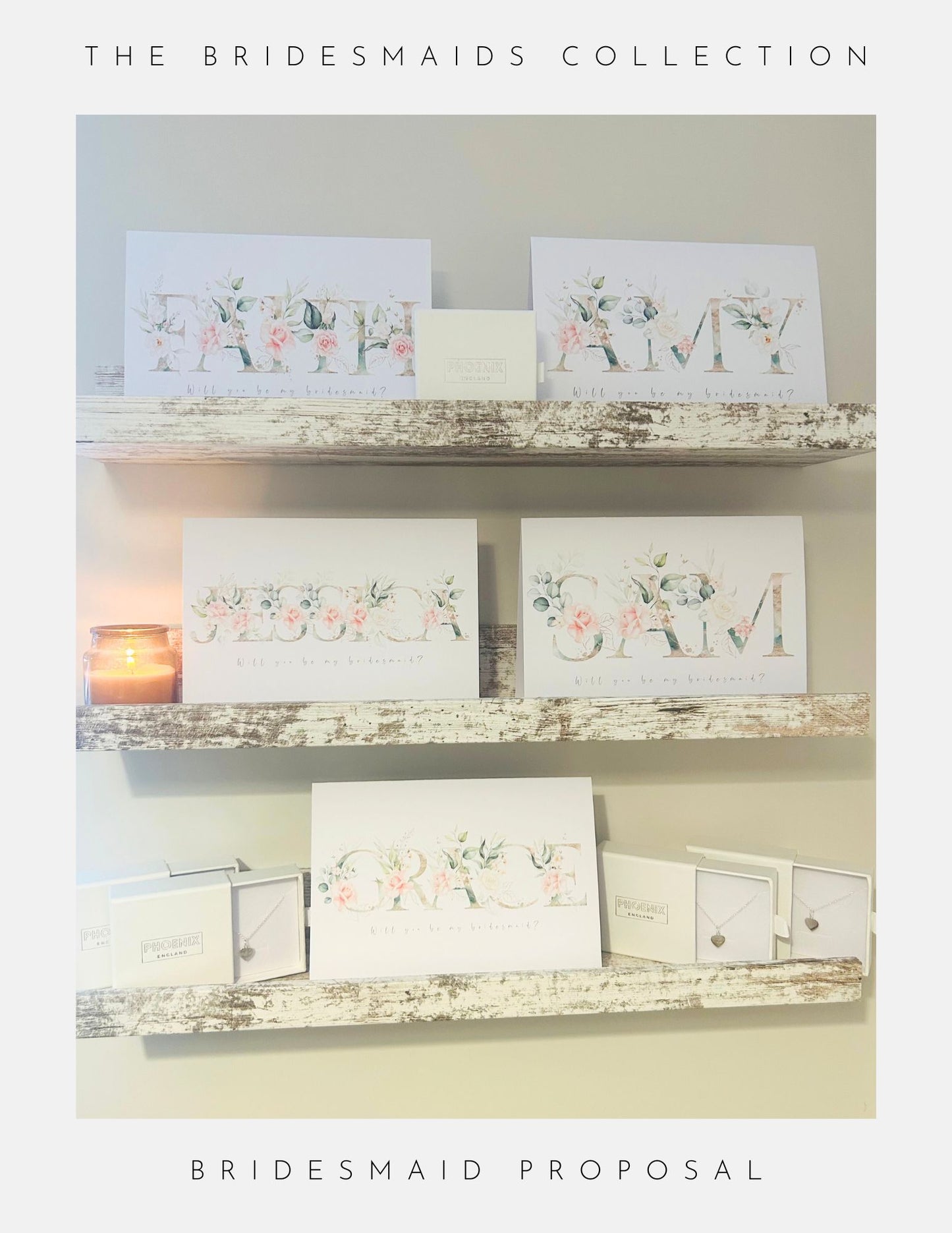 Three rustic white shelves display Phoenix England’s Bridesmaids Proposal Ideas Sterling Silver gifts in small boxes with pastel floral cards featuring names. A lit candle sits on the left. Text reads “The Bridesmaids Collection” and “Bridesmaid Proposal.”.