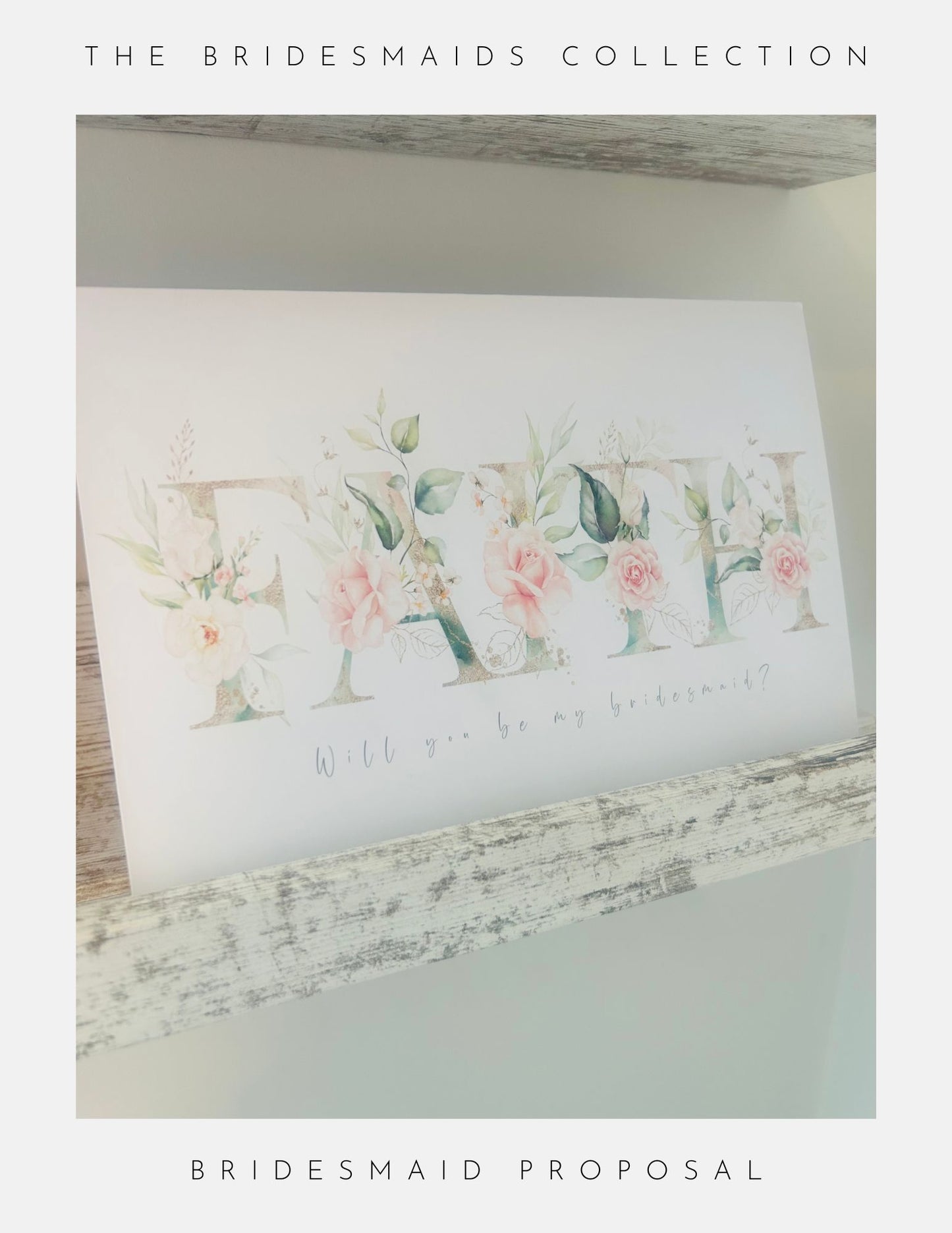 A card from Phoenix Englands Bridesmaids Proposal Ideas Sterling Silver collection is displayed on a wooden shelf, reading Will you be my bridesmaid?—a perfect bridesmaid proposal gift. Border: The Bridesmaids Collection and Bridesmaid Proposal.