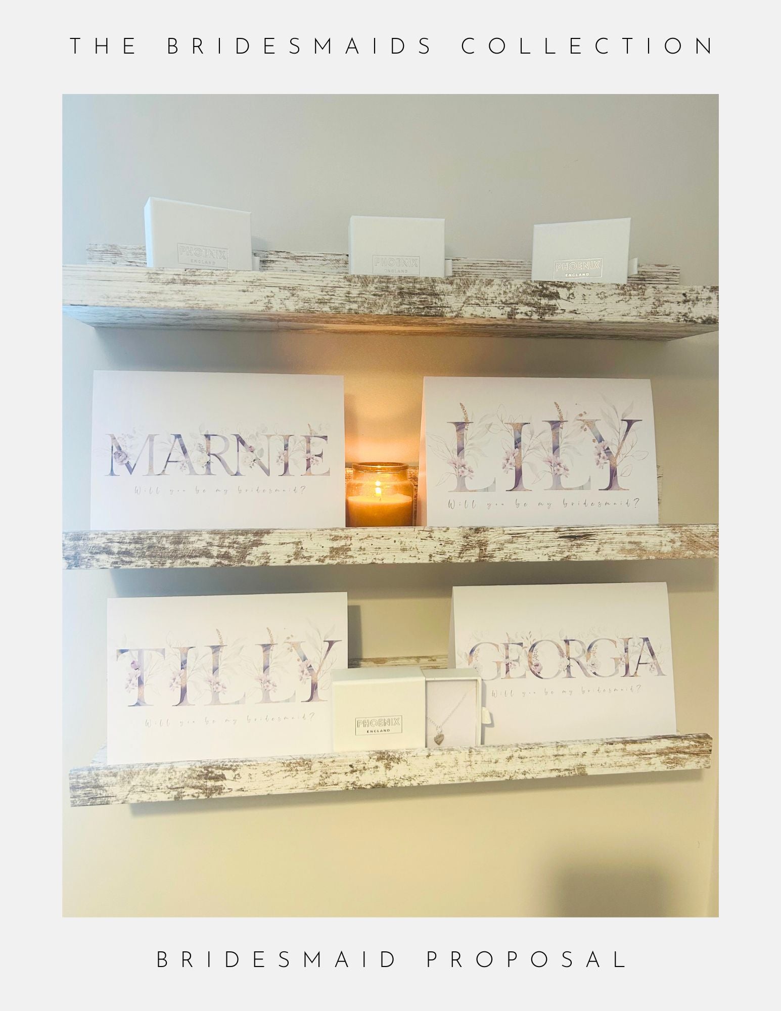 Two rustic white wooden shelves display Phoenix England Bridesmaids Proposal Sterling Silver cards with names (Marnie, Lily, Tilly, Georgia) and gift boxes. A lit candle sits in the center. Text frames the image—perfect for wedding moments.