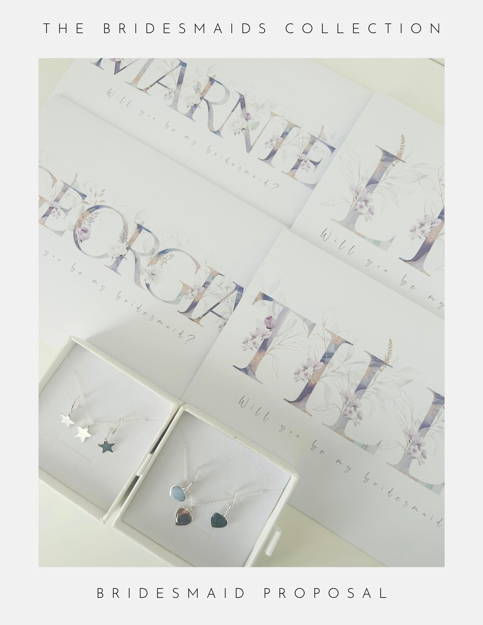A flat lay of Phoenix England Bridesmaids Proposal Sterling Silver necklaces—stars, hearts, and circles—in white boxes with personalized floral Will you be my bridesmaid? cards. Text: The Bridesmaids Collection.