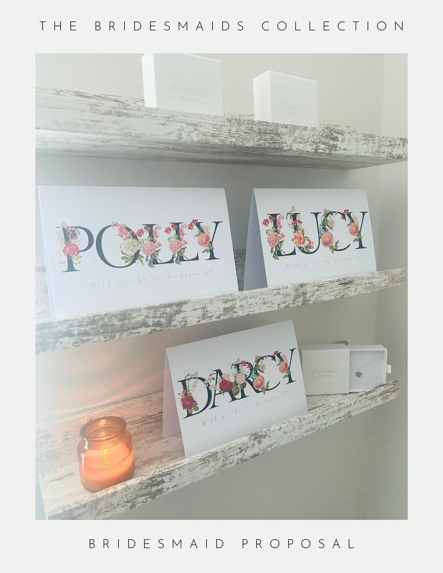 Three Phoenix England Bridesmaids Proposal Box Ideas cards with floral designs rest on rustic wooden shelves, paired with white boxes and a lit candle. Above: The Bridesmaids Collection. Below: Bridesmaid Proposal.