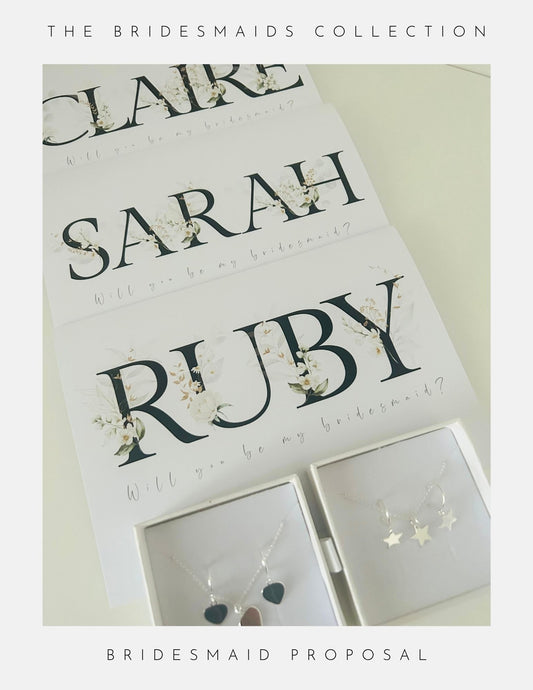 Phoenix England Bridesmaids Proposal Cards for Claire, Sarah, and Ruby each ask Will you be my bridesmaid? and come with a sterling silver necklace in an elegant jewelry box.