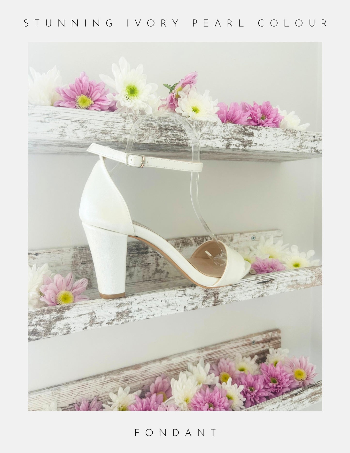 Ivory high-heeled open toe block heel shoe on a wooden surface with flowers, labelled 'Fondant'.