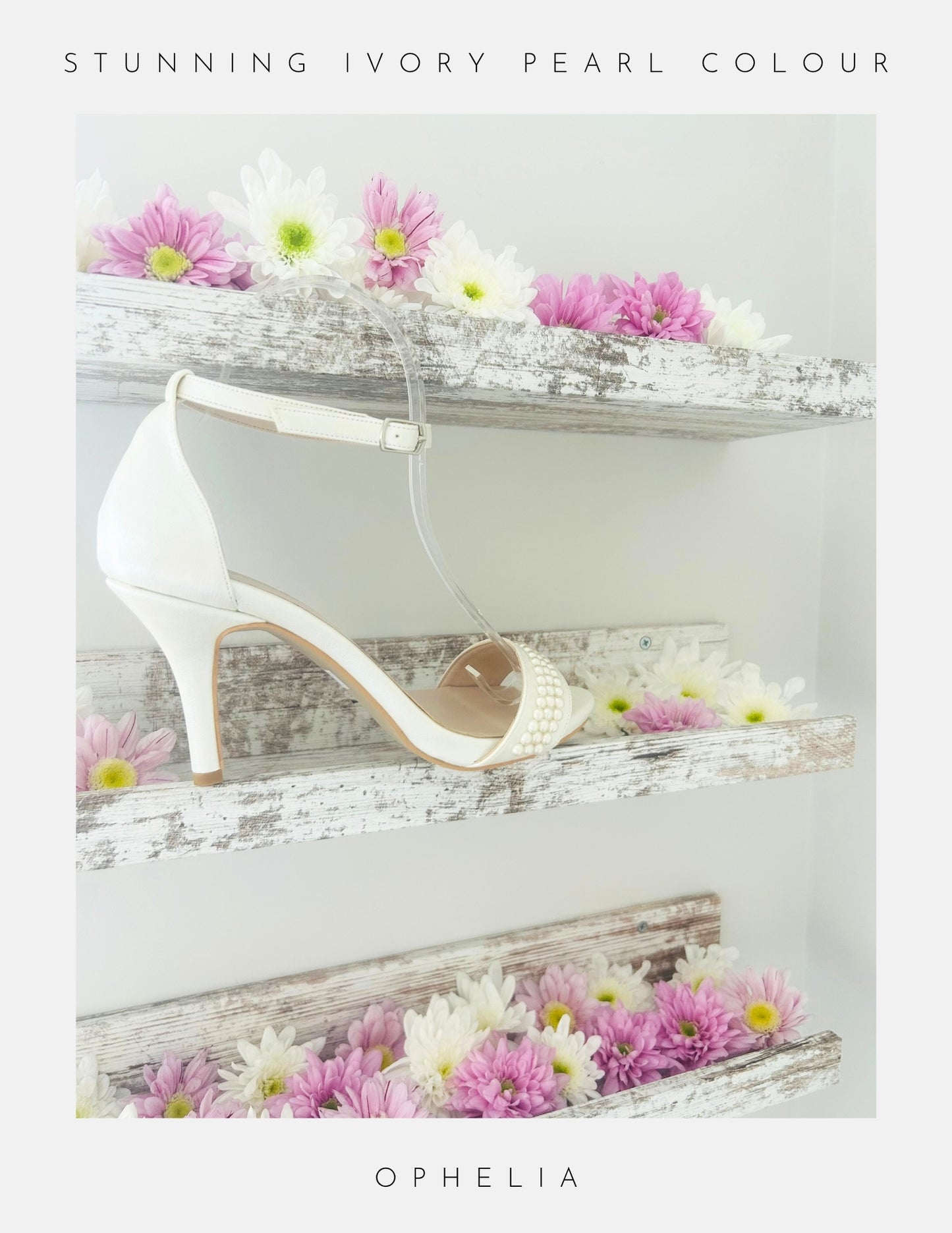 Ophelia Pearl High Heel Wedding Shoes by Phoenix England displayed on a rustic white shelf with pink and white daisies. Text: Stunning Ivory Pearl Colour and Ophelia bridal shoes.