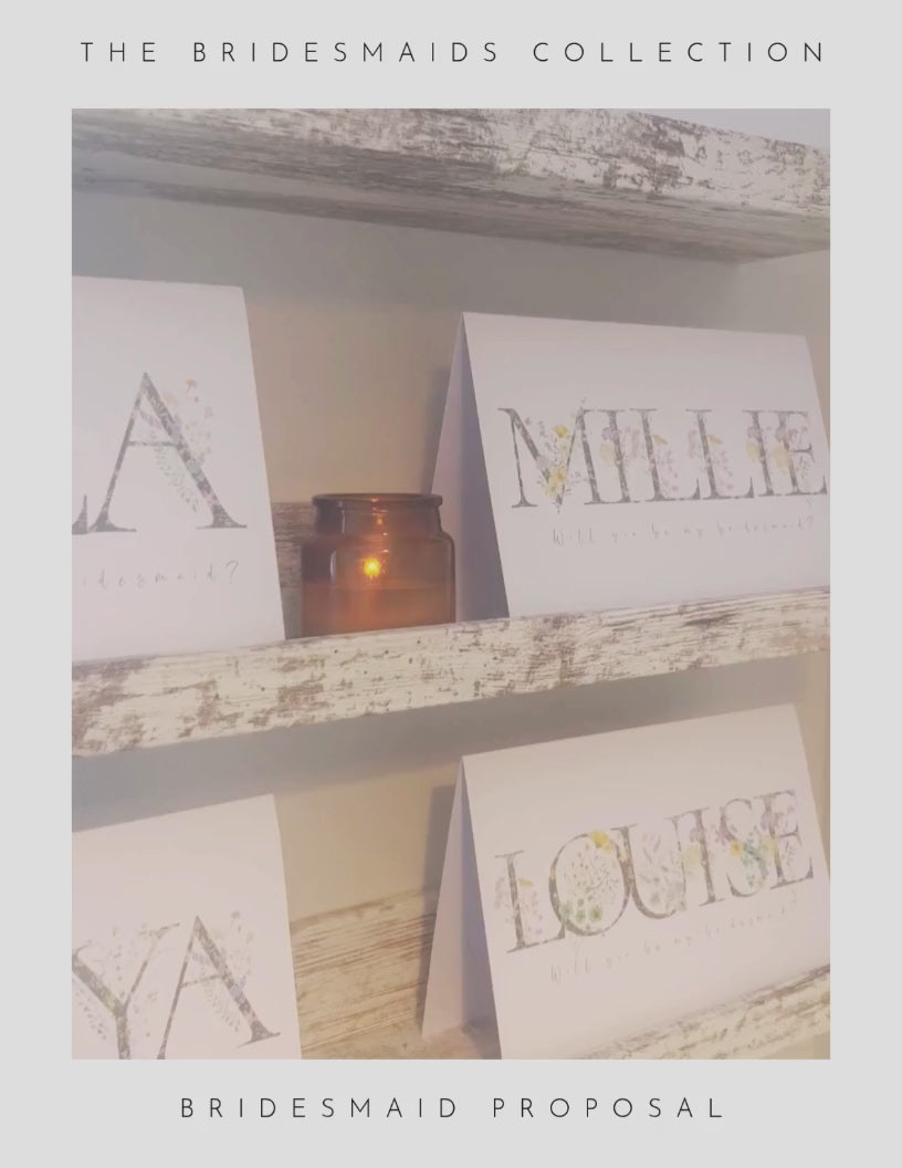 Video showing floral personalised will you be my bridesmaids cards.