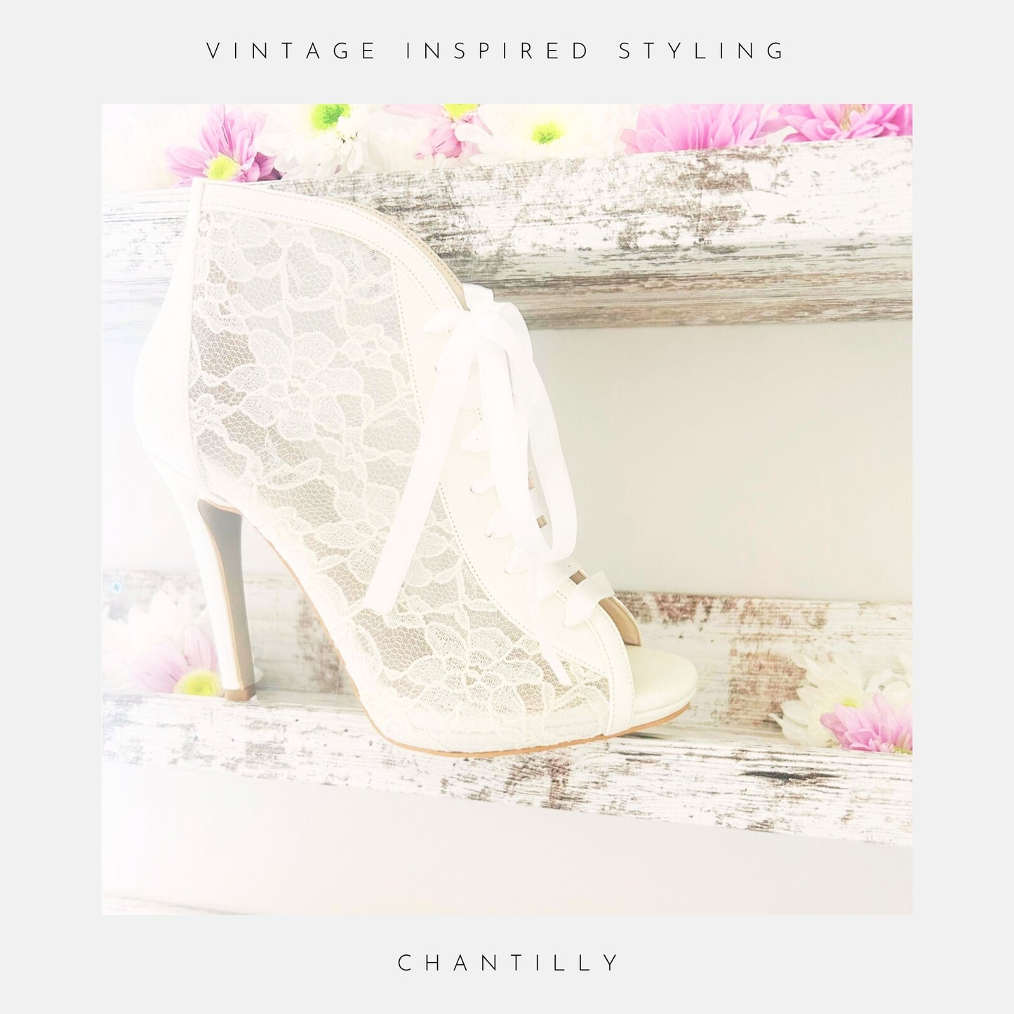 Ivory lace high-heeled wedding boots on a wooden surface with flowers, labelled 'Vintage Inspired Styling' and 'Chantilly'.