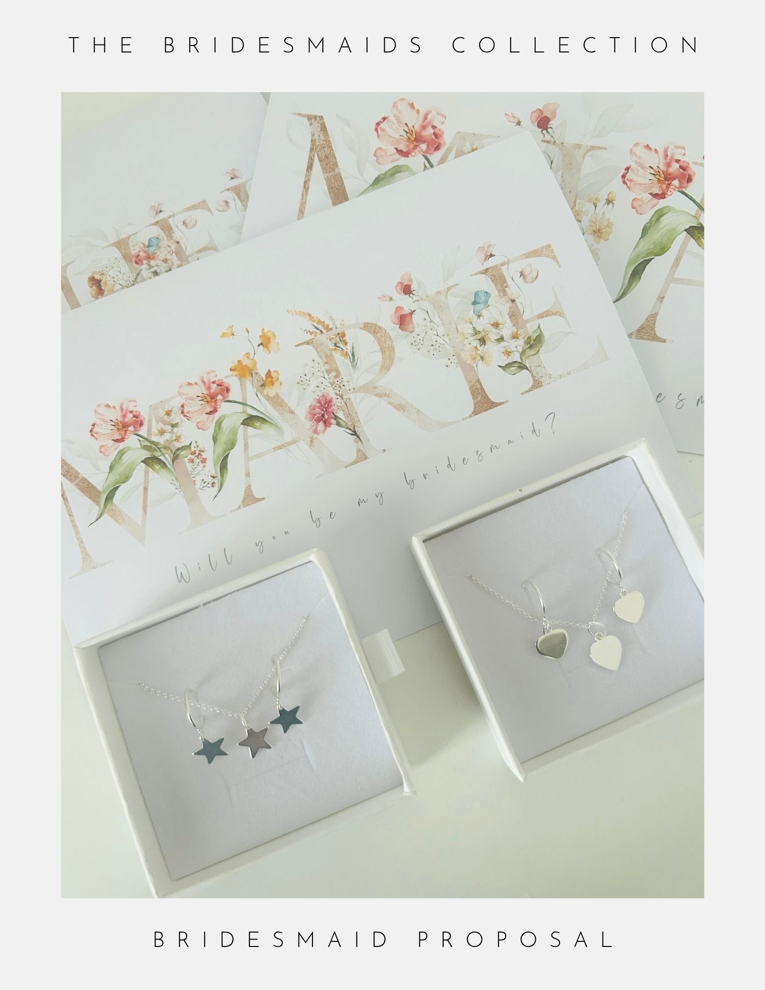 Two jewelry boxes with sterling silver jewellery—one with three star pendants, the other with two heart pendants—plus floral “Will You Be My Bridesmaid?” cards by Phoenix England make perfect bridesmaid gifts from the Will You Be My Bridesmaid Gifts collection.