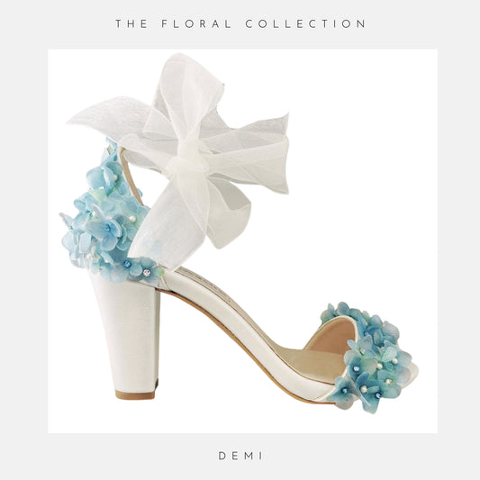 Pretty high block heel bridal shoe with open toe and finished with elegant hydrangea flowers.