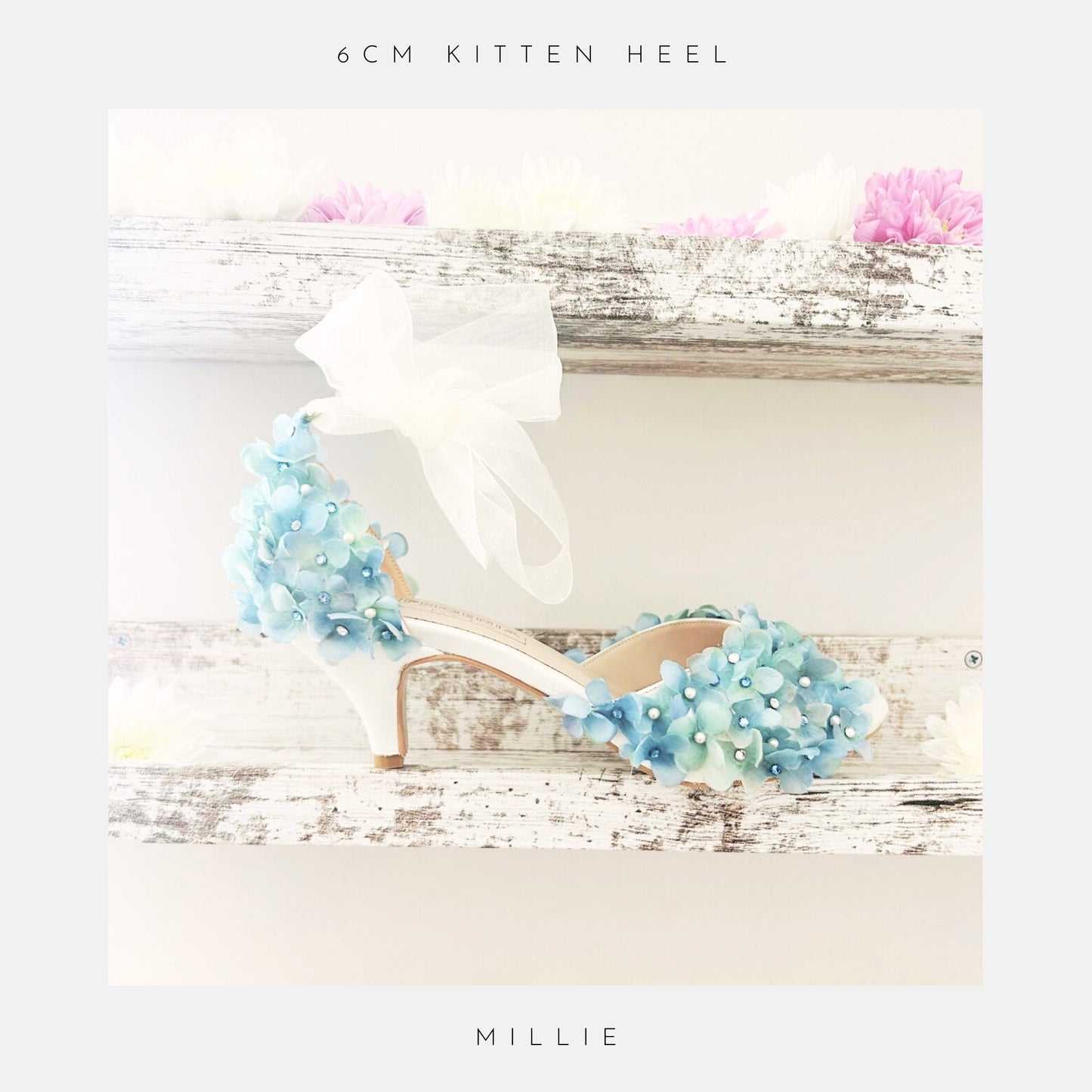 Floral embellished high-heeled bridal shoes on a wooden surface with 'The Floral Collection' text.
