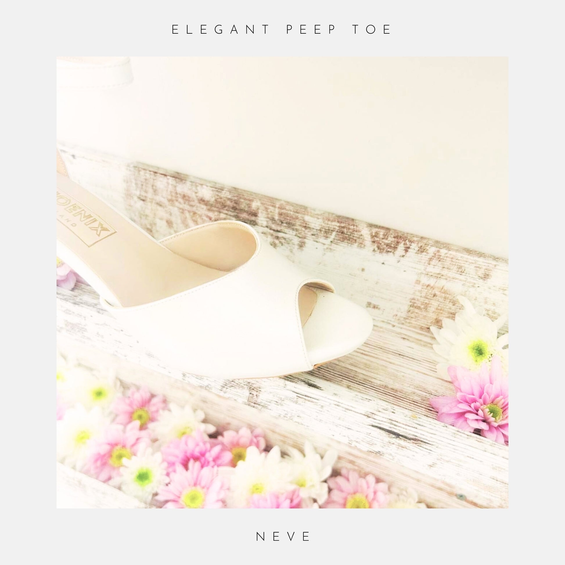 Close up of peep toe ivory kitten heel bridal shoe on a wooden surface with flowers, labelled 'Elegant Peep Toe' and 'Neve'.