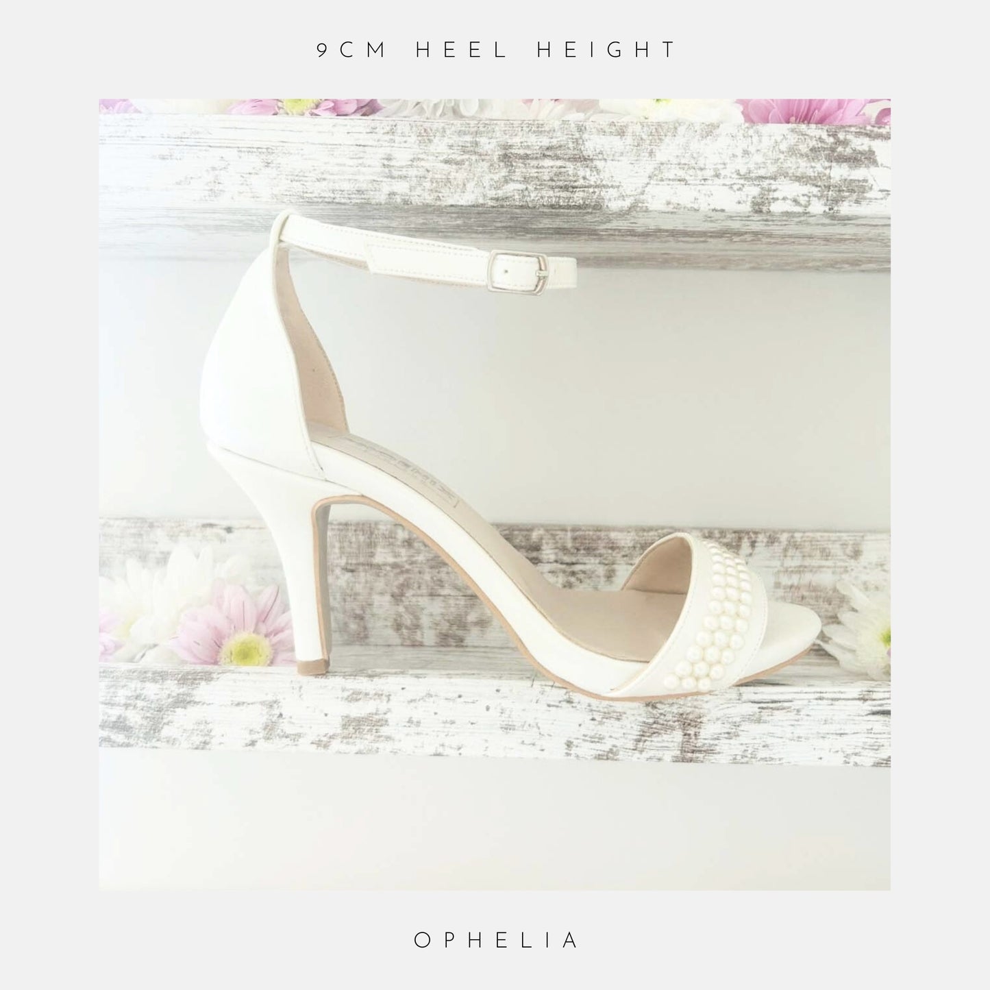 The Ophelia Pearl High Heel Wedding Shoes by Phoenix England are displayed on a rustic white shelf with pink and white daisies. Crystal pearls adorn the front strap. Text reads: 9cm heel height and Ophelia. Perfect bridal shoes.