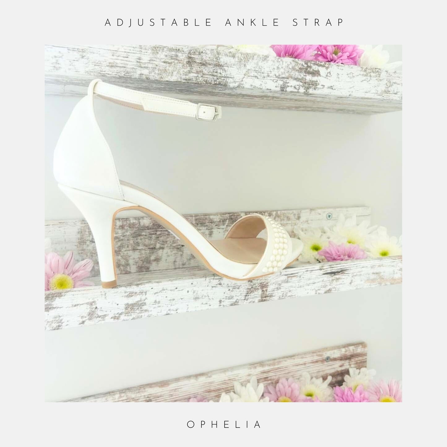 Ophelia Pearl High Heel Wedding Shoes by Phoenix England displayed on a rustic white shelf with pink and white daisies. Text: Adjustable Ankle Strap and Ophelia bridal shoes.