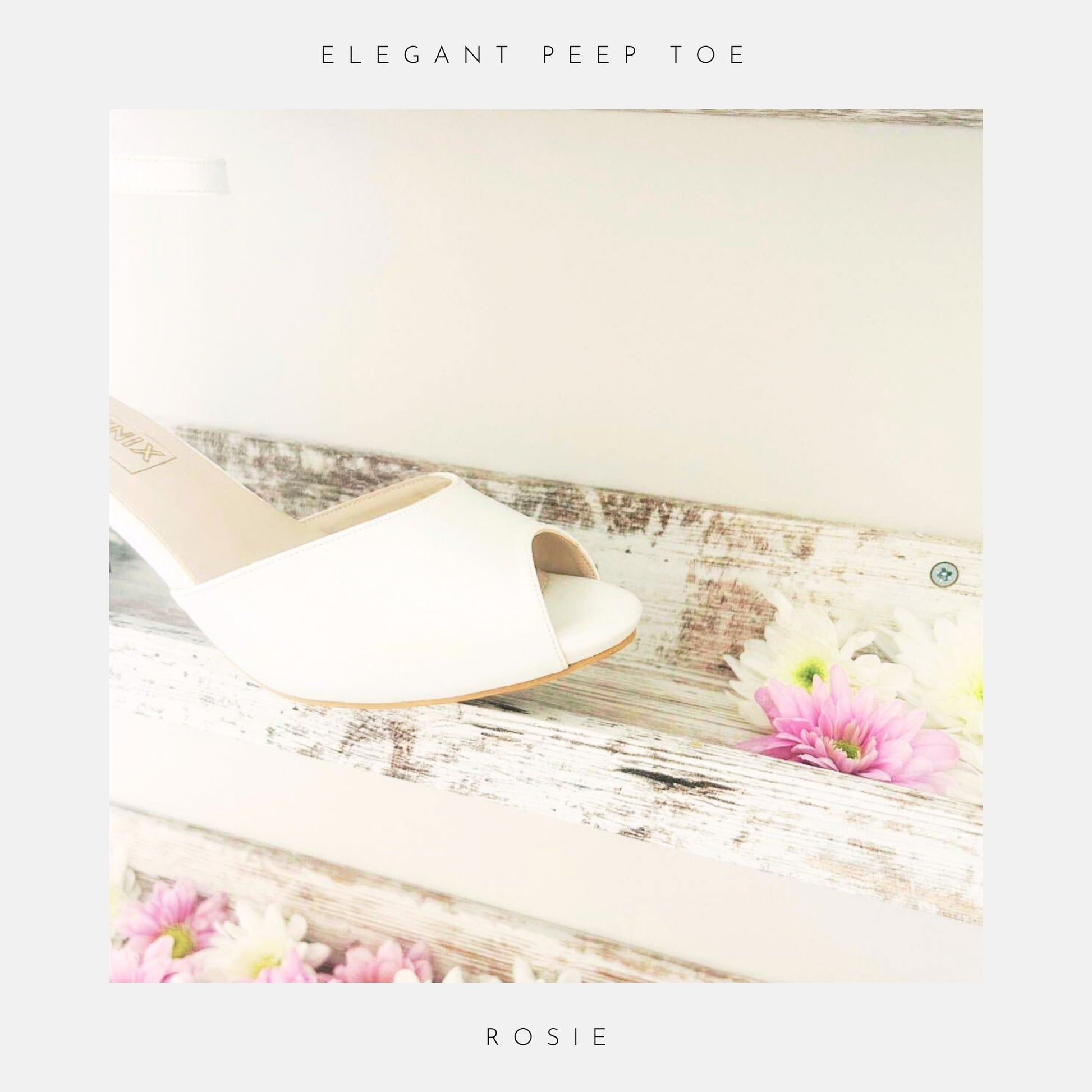 A close up of the front of an ivory peep toe bridal shoe.