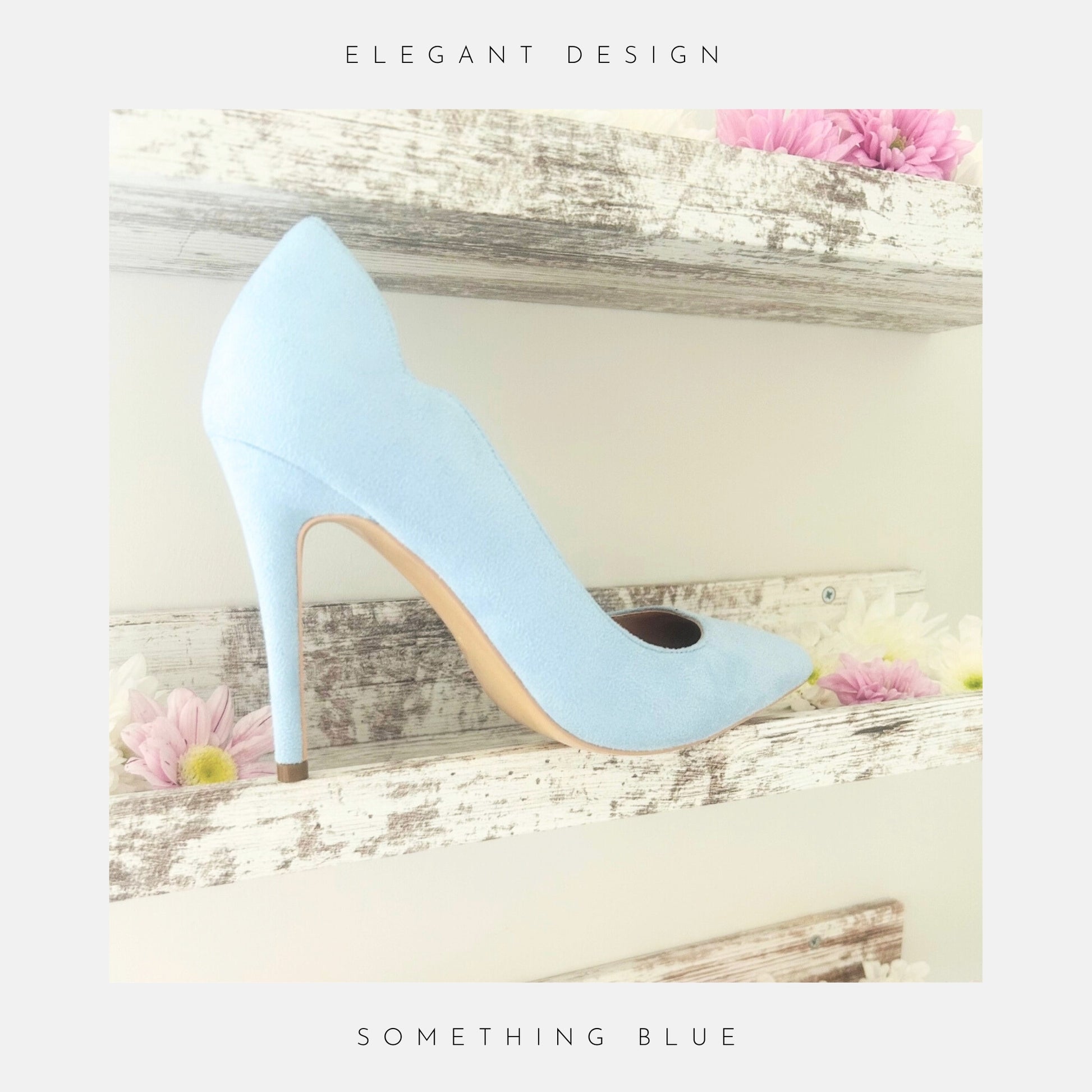 Blue faux suede high-heeled bridal shoe on a decorative wooden shelf with flowers.