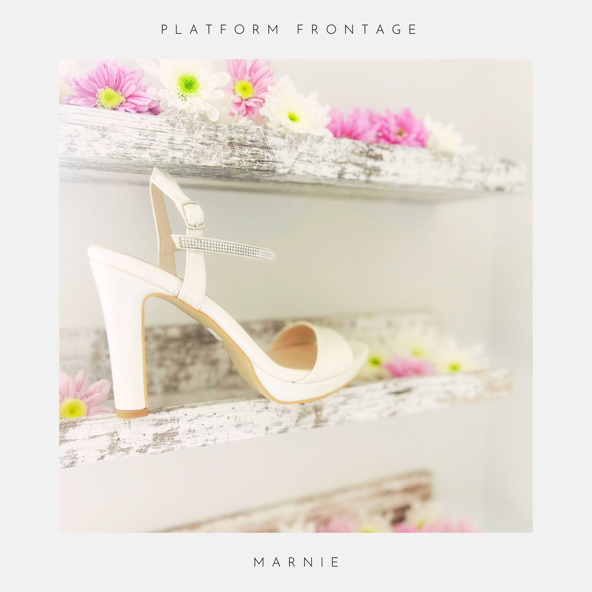 Ivory high-heeled platform wedding shoe with 'Marnie' branding on a decorative background with flowers.