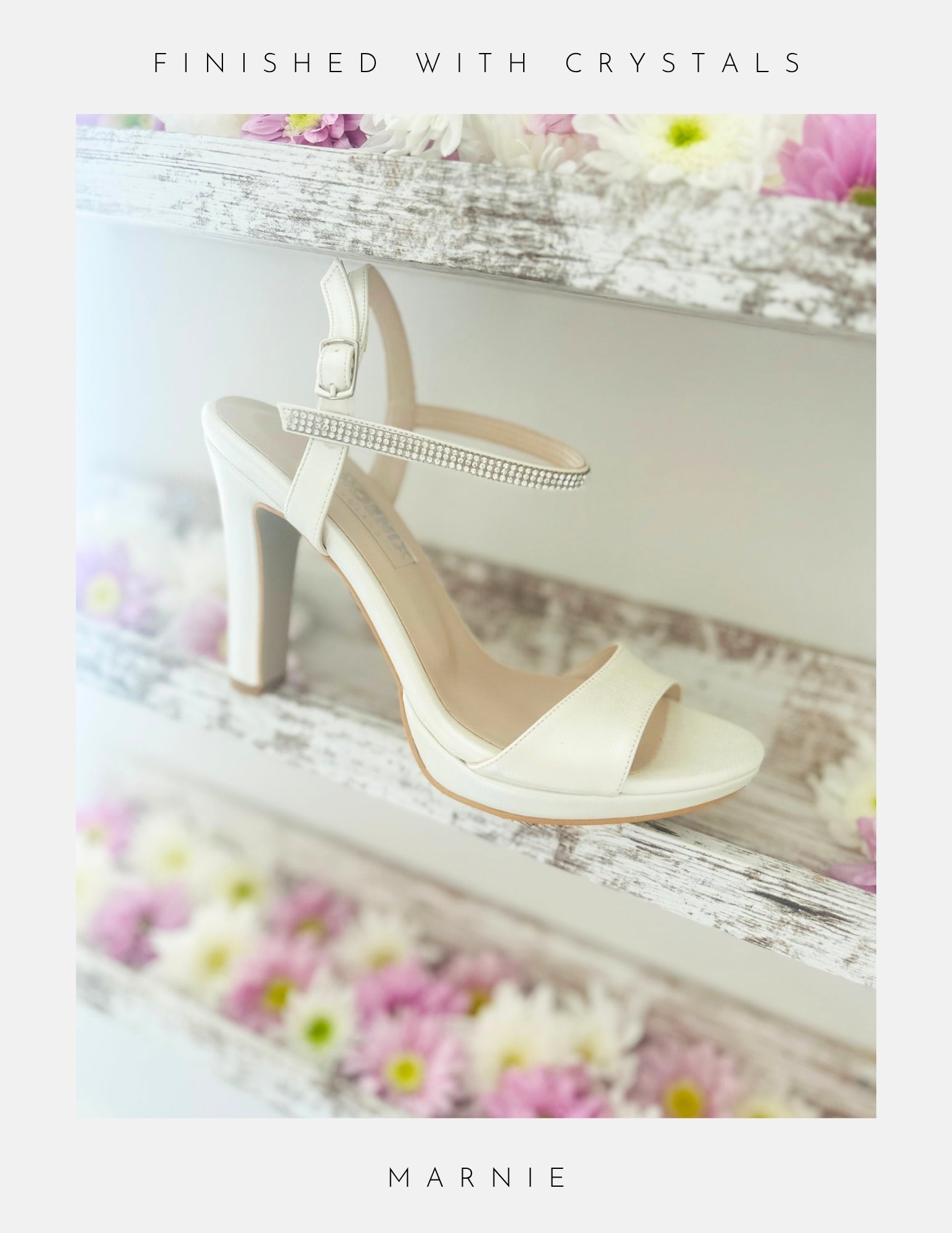 Ivory high-heeled shoe with crystal embellishments on a floral background, featuring the name 'Marnie'.