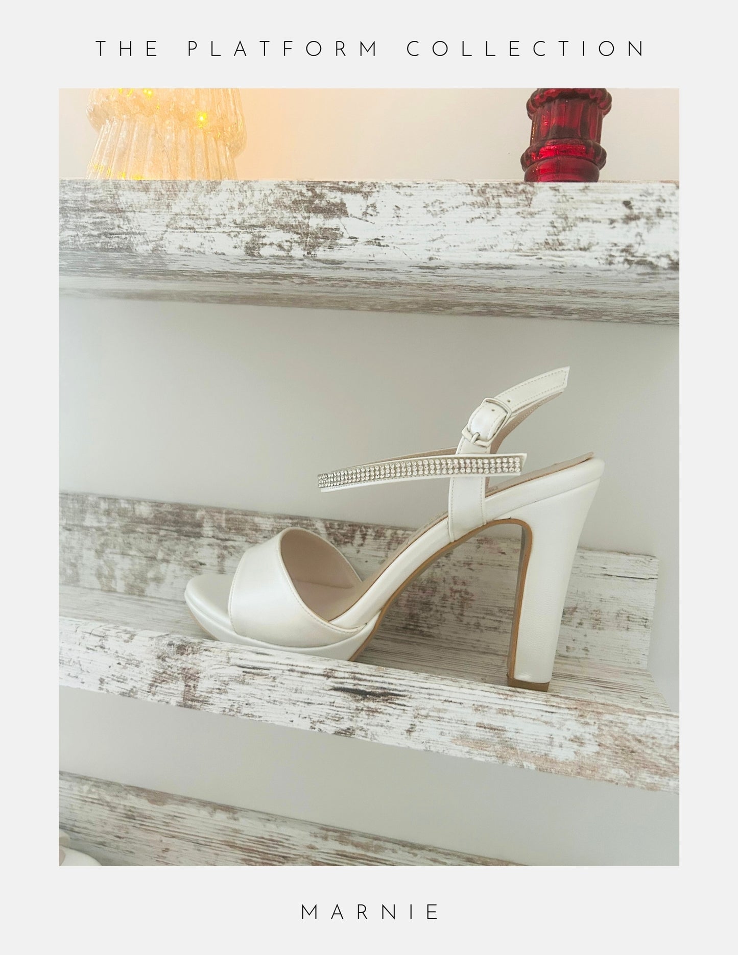 An ivory platform heel sandal with a rhinestone strap from Phoenix England sits on a rustic white shelf. The image features The Platform Collection above and Marnie Wedding Shoes below, perfect bridal shoes for your special day.