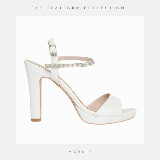 Ivory high-heeled platform bridal sandal on a white background labelled the platform collection by Phoenix England UK