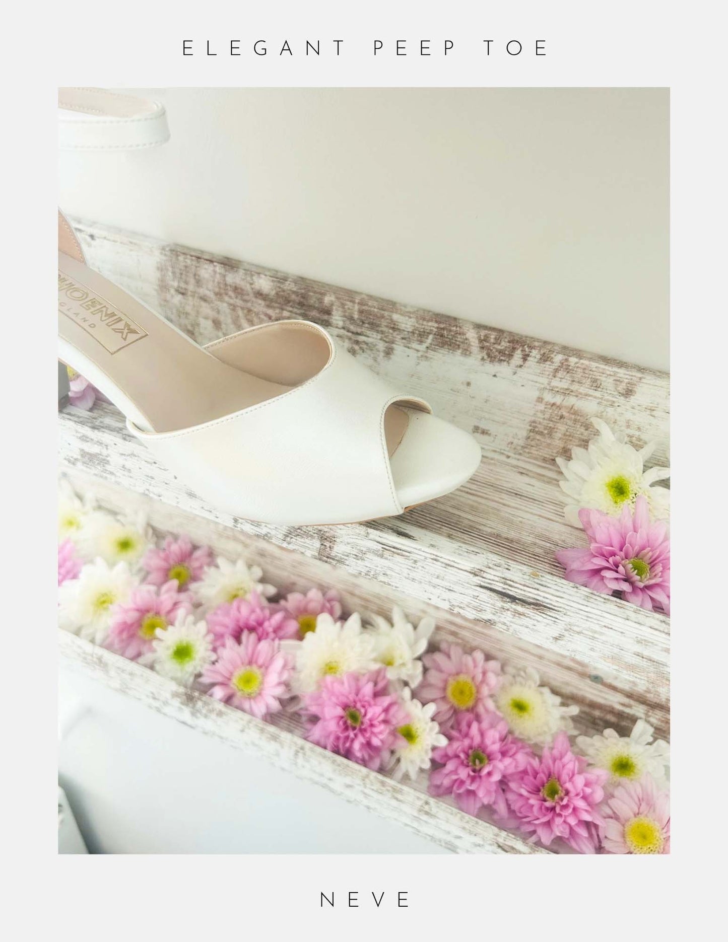 Close up of peep toe ivory kitten heel bridal shoe on a wooden surface with flowers, labelled 'Elegant Peep Toe' and 'Neve'.